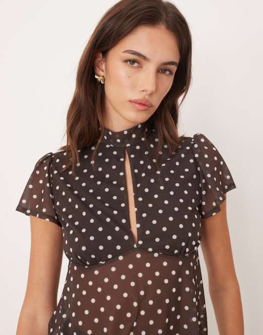 ASOS DESIGN floaty mesh flutter sleeve top with tie back detail in brown and white polka dot