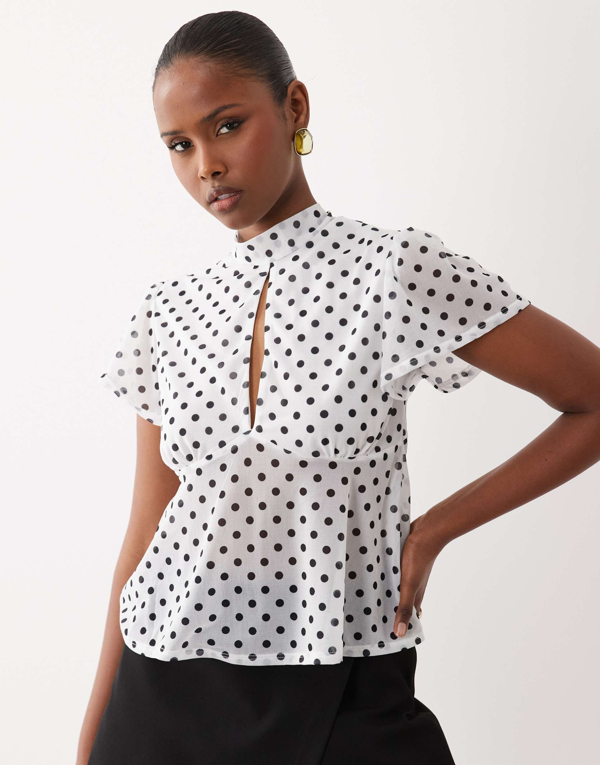 asos design floaty mesh flutter sleeve top with tie back detail in mono polka dot
