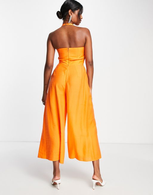 ASOS DESIGN floaty twist front peg leg jumpsuit in orange