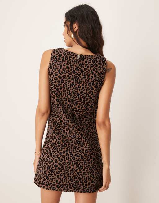 ASOS DESIGN flocked denim mini dress in dark leopard print | ASOS