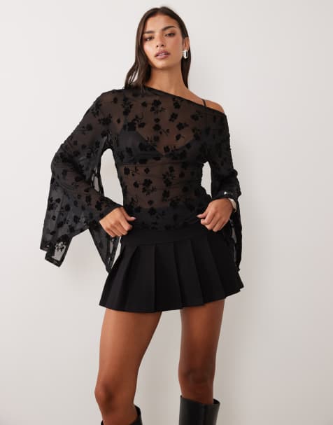ASOS DESIGN flocked flare sleeve top with asymmetric hem in black - view 1