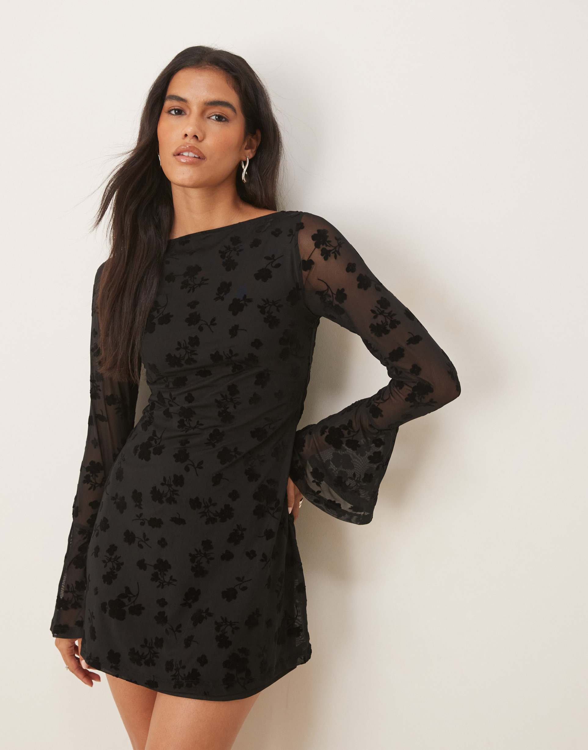 asos design flocked floral mini dress with flute sleeve in black