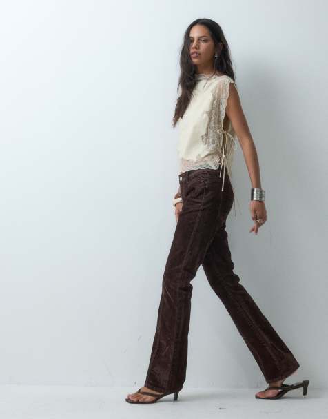 ASOS DESIGN flocked kick flare jeans in chocolate - view 1