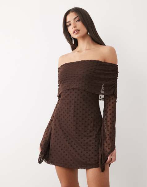 ASOS DESIGN flocked polka dot mini bardot off shoulder dress with exaggerated flute sleeve in brown