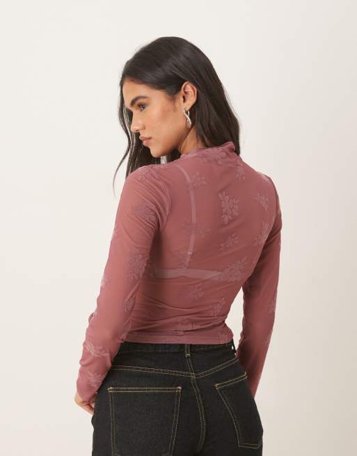 ASOS DESIGN flocked ruched high neck long sleeve top in pink