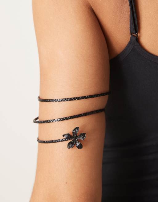 ASOS DESIGN floral arm cuff in dark charcoal tone, 2 of 3