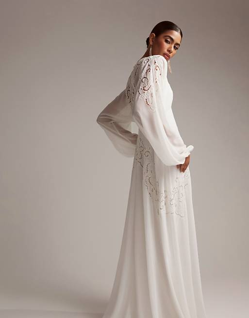 asos wedding dress DESIGN Selena embellished placement The ASOS DESIGN square neck structured full skirt mini wedding dress in ivory offers a modern yet elegant look for your special day ASOS DESIGN Florence plunge long