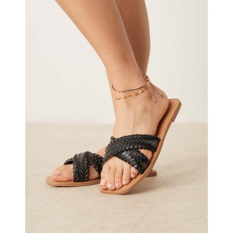 ASOS DESIGN Flossie woven flat sandals in black ASOS