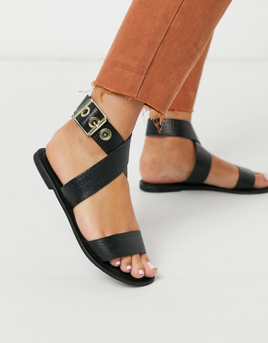 ASOS DESIGN - Flossy - Leren platte sandalen met gekruiste bandjes in zwart met krokodillenprint
