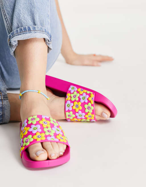 ASOS DESIGN Flower power flower print sliders in pink ASOS