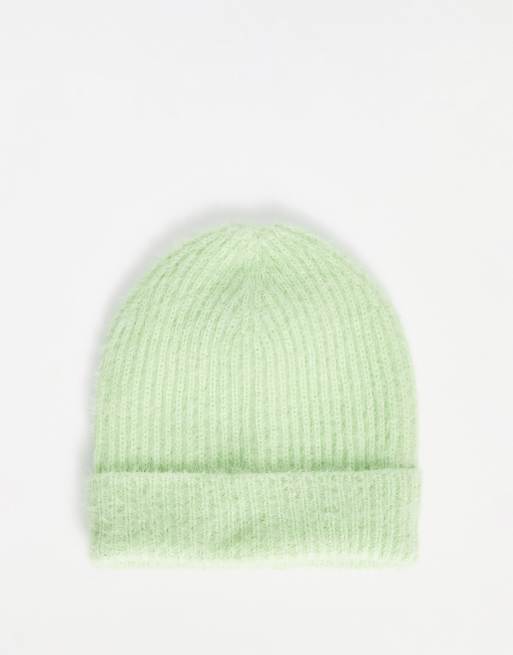 ASOS Design Cable Knit Beanie with Faux Fur Pom in sage-Green