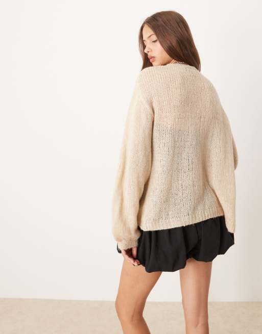 ASOS DESIGN fluffy knit cardigan with balloon sleeves in ecru