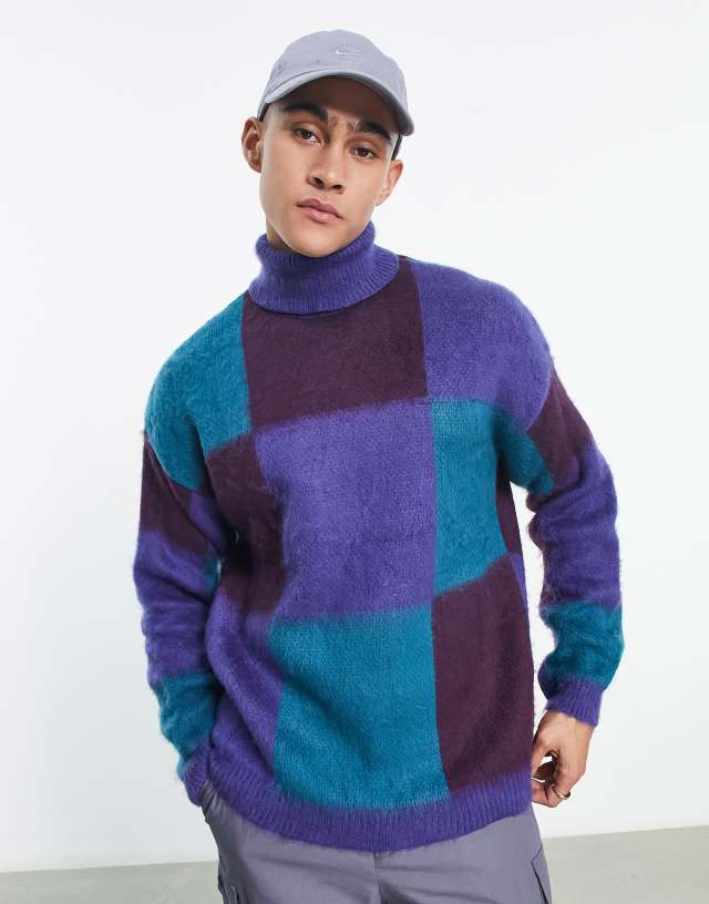 ASOS DESIGN fluffy knit checkerboard roll neck sweater in blue & purple