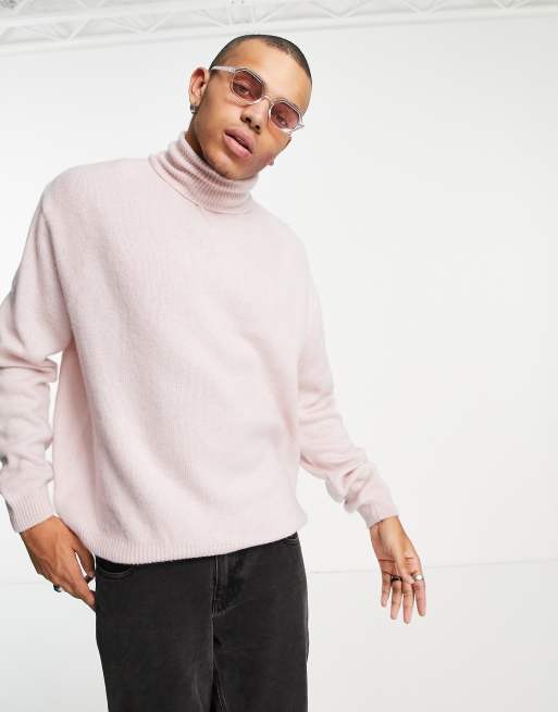 ASOS DESIGN fluffy knit roll neck jumper in pink