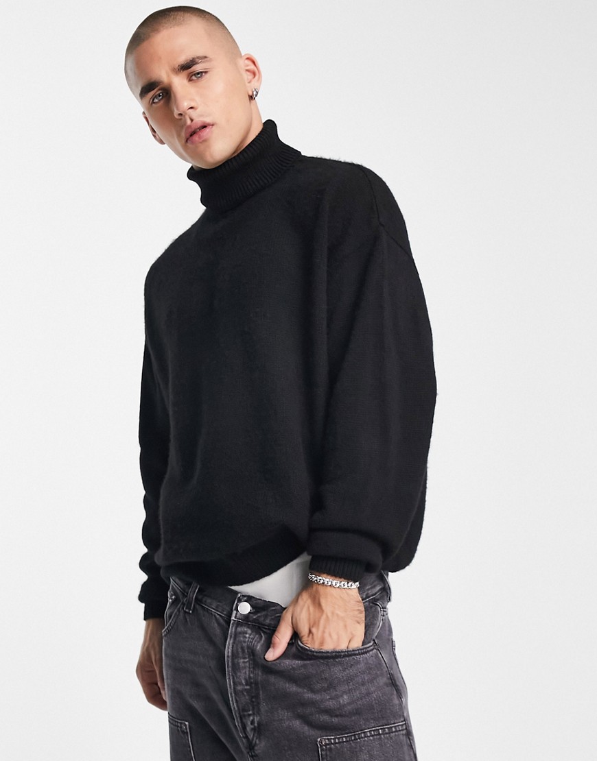 ASOS DESIGN fluffy knitted roll neck sweater in black
