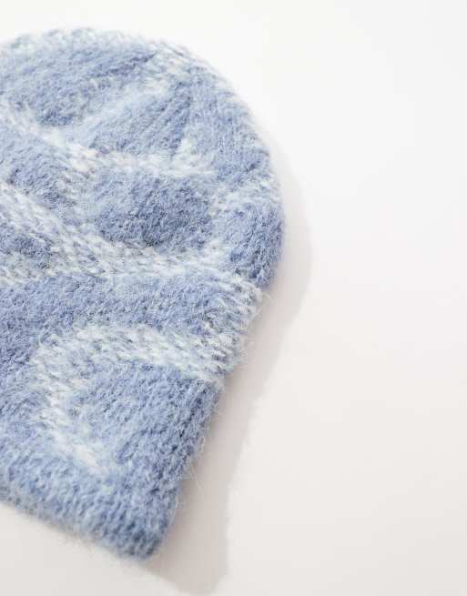 ASOS DESIGN fluffy skull beanie in blue with white pattern, 2 of 4