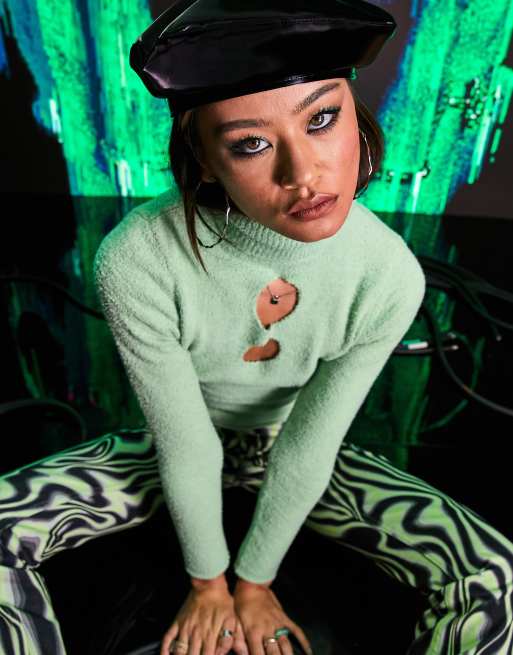 ASOS DESIGN fluffy sweater with roll neck and cut out detail in green