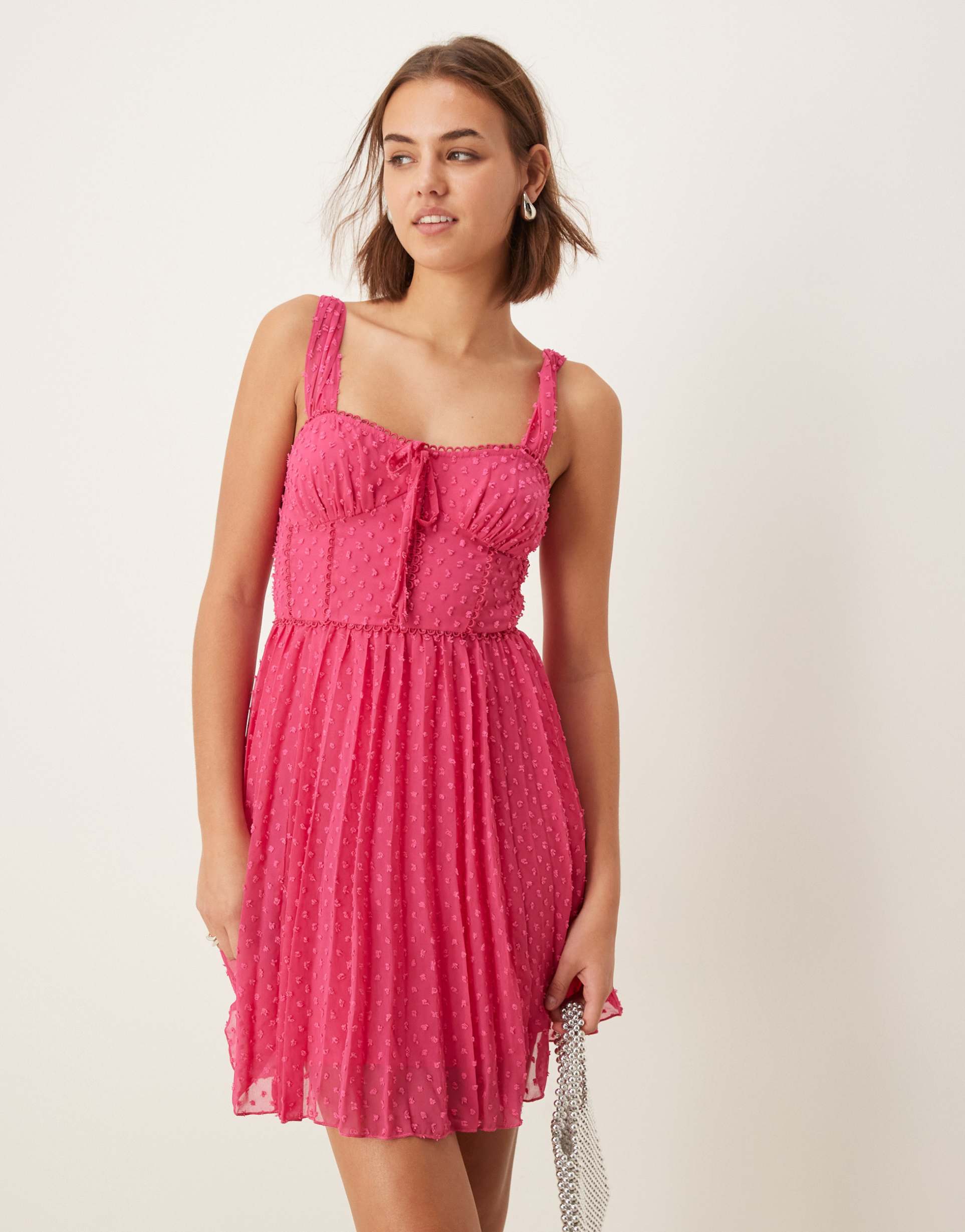 asos design fluffy textured milkmaid bust pleated mini dress in hot pink