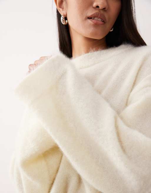 ASOS DESIGN fluffy wide sleeve knitted jumper in ecru