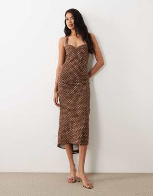 ASOS DESIGN flute hem halter dress in brown polka dot