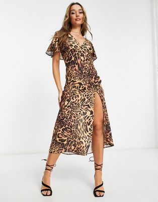 ASOS DESIGN fluted sleeve maxi dress with cut out back in animal print  - ASOS Price Checker