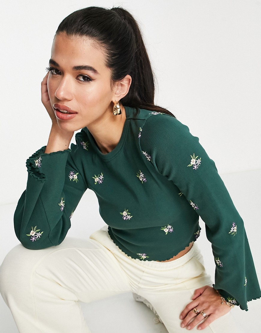 ASOS DESIGN fluted sleeve ribbed floral embroidery top in bottle green