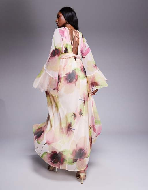 ASOS DESIGN fluted sleeve twist front maxi dress with plunge neckline in pink floral print