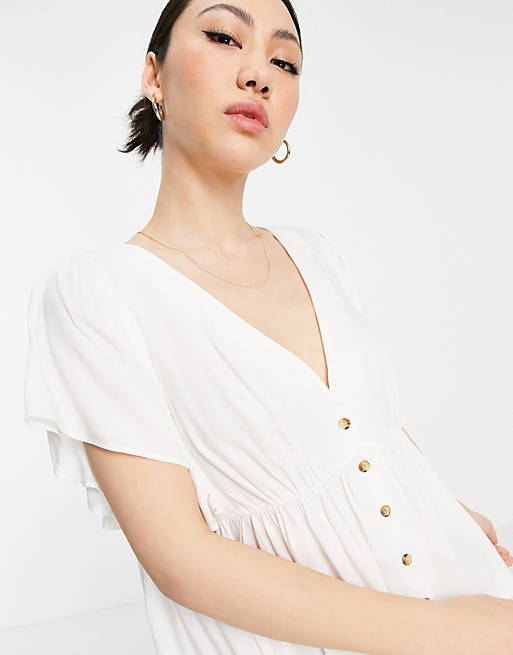 Women Shirts & Blouses/flutter sleeve button through top with elastic waist in ivory 
