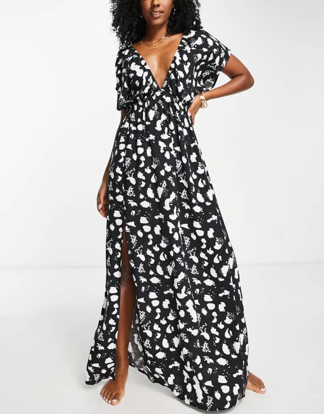 ASOS DESIGN flutter sleeve maxi beach dress in mono spot print