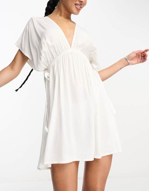 ASOS DESIGN flutter sleeve mini beach dress with channeled tie waist in white