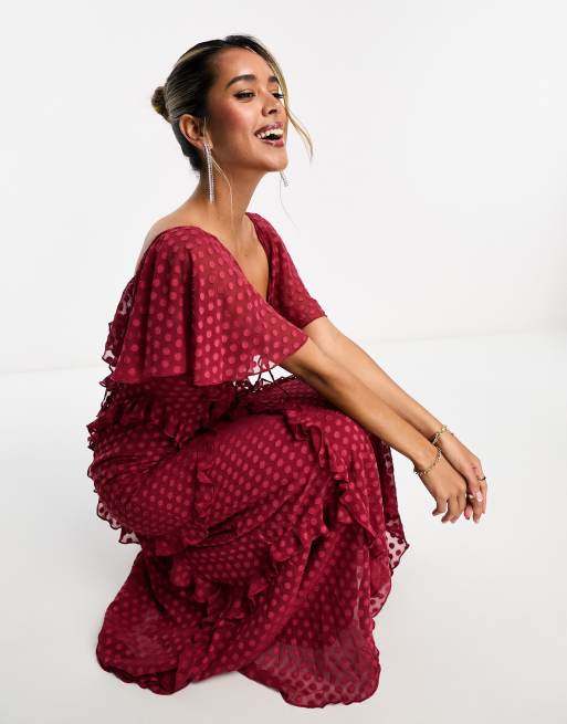 ASOS DESIGN flutter sleeve ruffle maxi dress with cut out detail in  textured spot in dark red