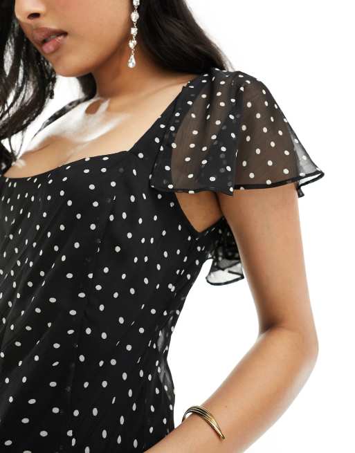 ASOS DESIGN flutter sleeve scoop neck bias paneled mini dress in black polka dot ASOS