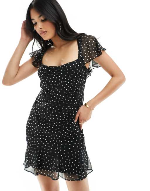 ASOS DESIGN flutter sleeve scoop neck bias paneled mini dress in black polka dot, 4 of 4