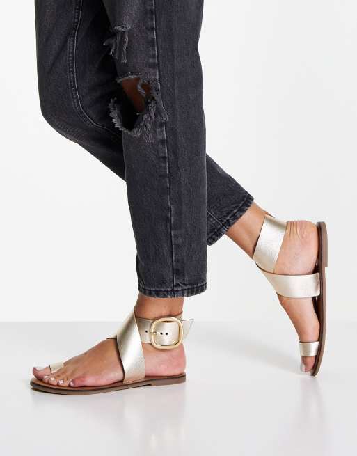 ASOS DESIGN Flyer leather toe loop flat sandals in gold