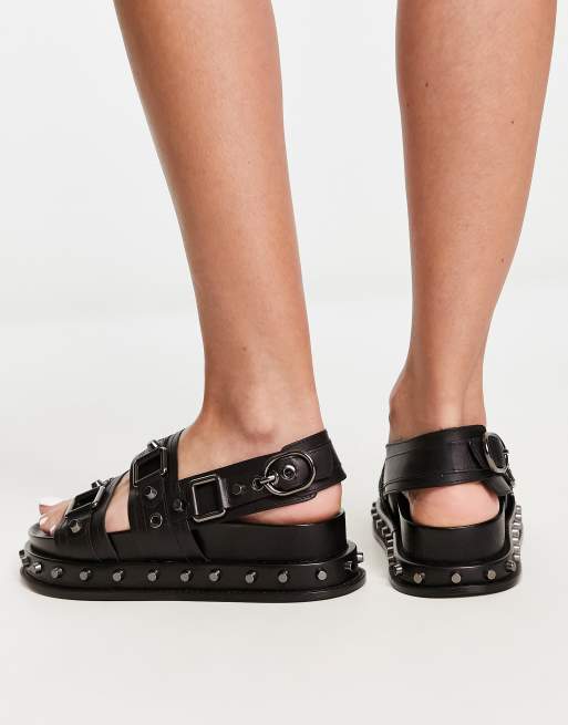 ASOS DESIGN Focused leather studded flat sandals in black ASOS