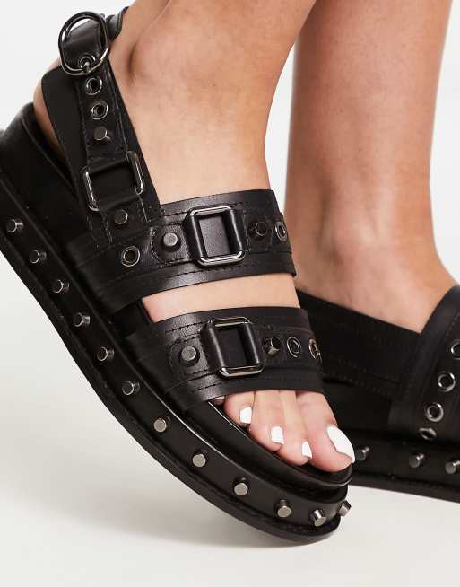 ASOS DESIGN Focused leather studded flat sandals in black