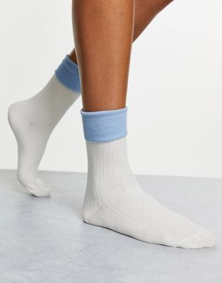 ASOS DESIGN fold top colour block socks in cream and blue