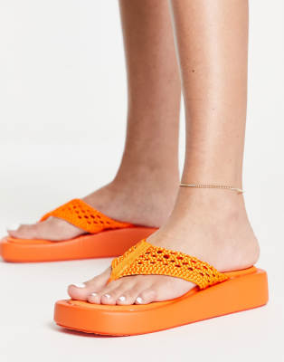 orange platform flip flops