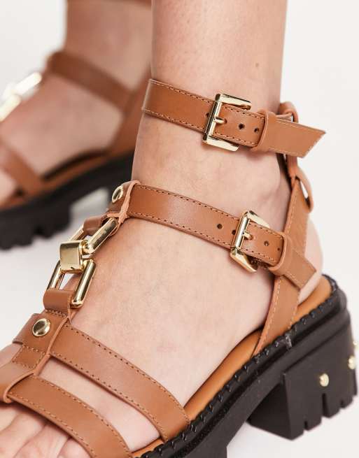 Sandali bassi in pelle con fascette hotsell