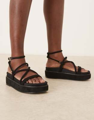 ASOS DESIGN - Fortitude - Riemchen-Sandalen in Schwarz mit flacher Plateausohle