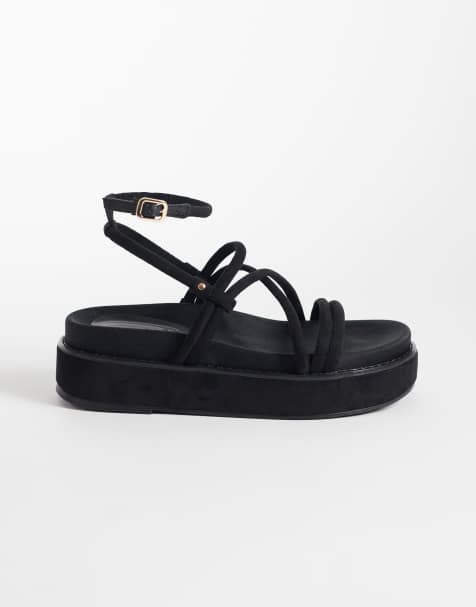 ASOS DESIGN – Fortitude – Riemchen-Sandalen in Schwarz mit flacher Plateausohle - view 1