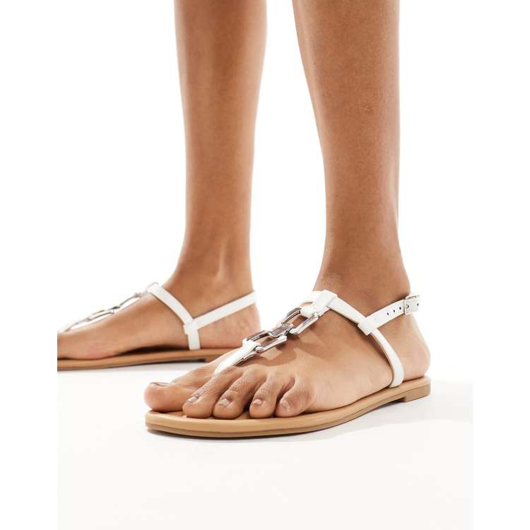 ASOS DESIGN Fortune hardware flat sandals in white ASOS