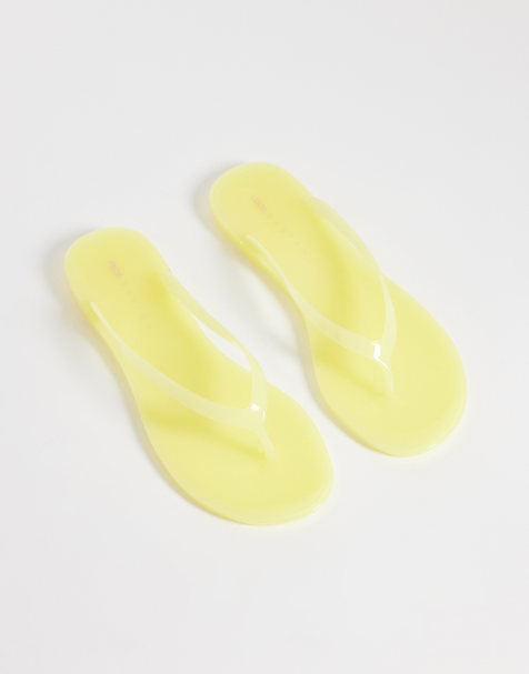 ASOS DESIGN Foxton jelly flip flops in lemon - view 1