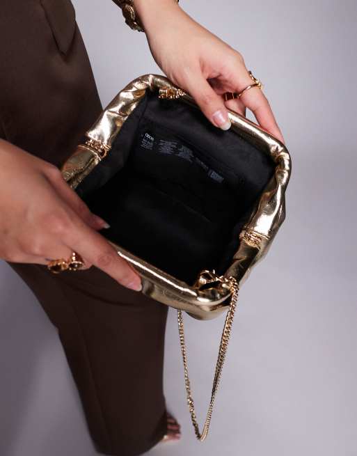 ASOS DESIGN frame clutch purse with detachable crossbody strap in gold tone