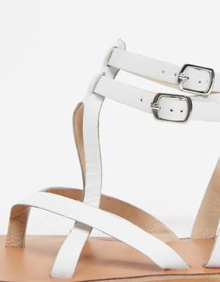 white leather gladiator sandals