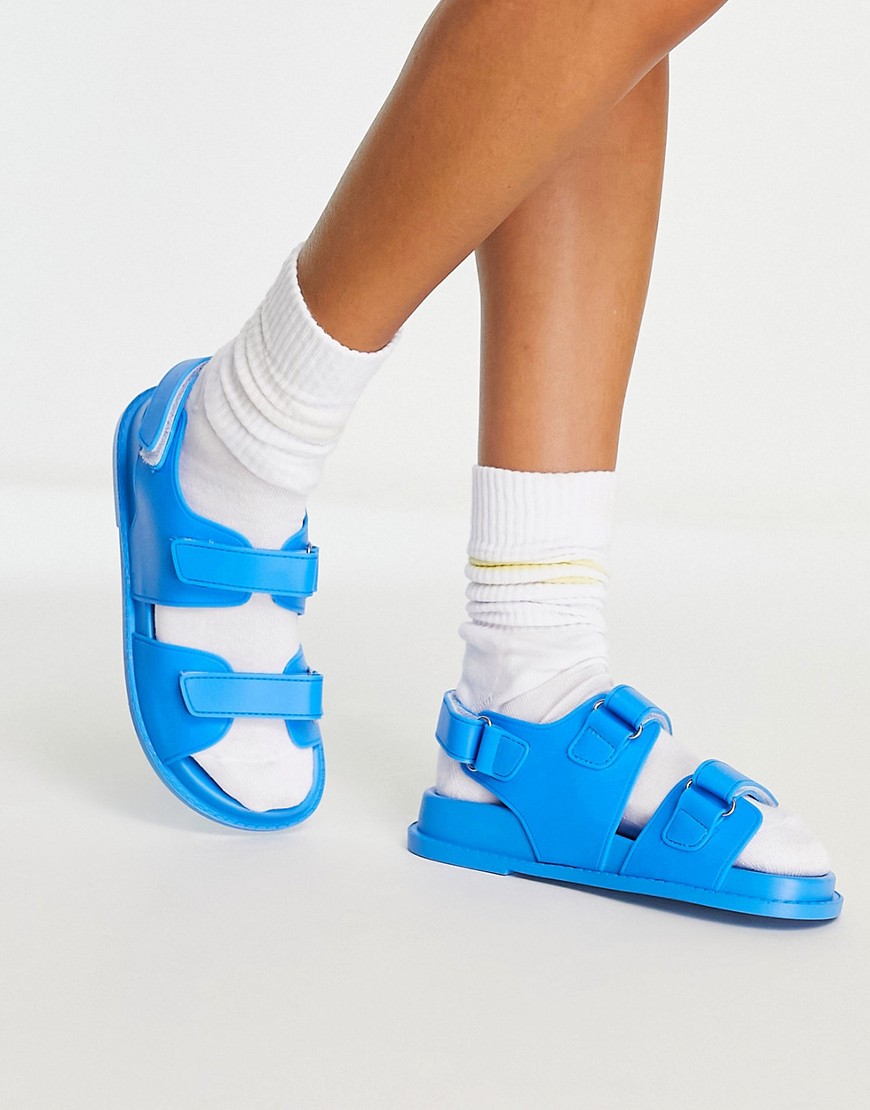 ASOS DESIGN France jelly flat sandals in blue
