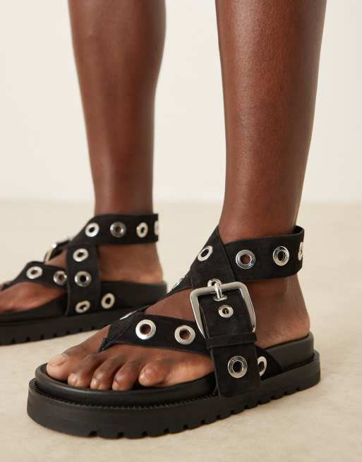 ASOS DESIGN – Francoise – Czarne, zamszowe sandały na płaskiej platformie, z ozdobnymi oczkami