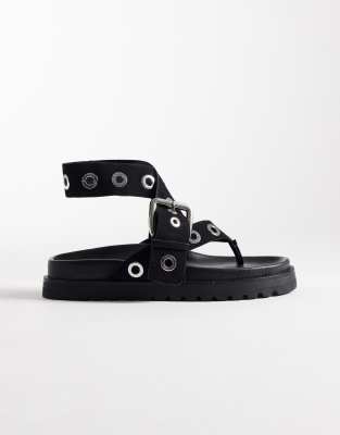 ASOS DESIGN Francoise eyelet flatform sandal in black suede
