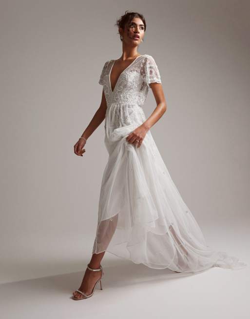 ASOS DESIGN Frankie beaded mesh plunge cap sleeve wedding dress in ivory