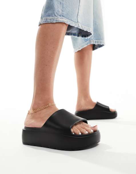 ASOS DESIGN Freedom cleated flatform sliders in black - view 1